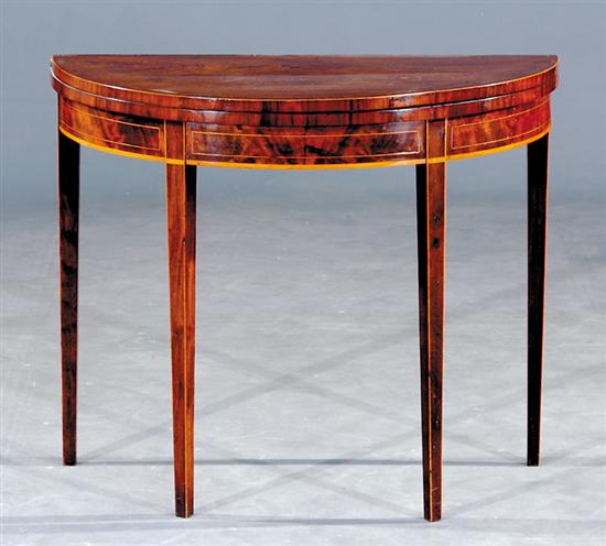 Appraisal: George III mahogany inlaid demilune card table circa banded and