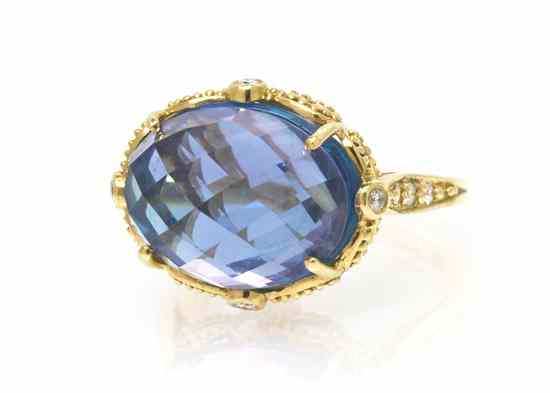 Appraisal: A Karat Yellow Gold Amethyst Blue Topaz and Diamond Ring