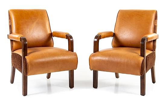 Appraisal: A Pair of Leather Upholstered Pullman Car Armchairs Height x