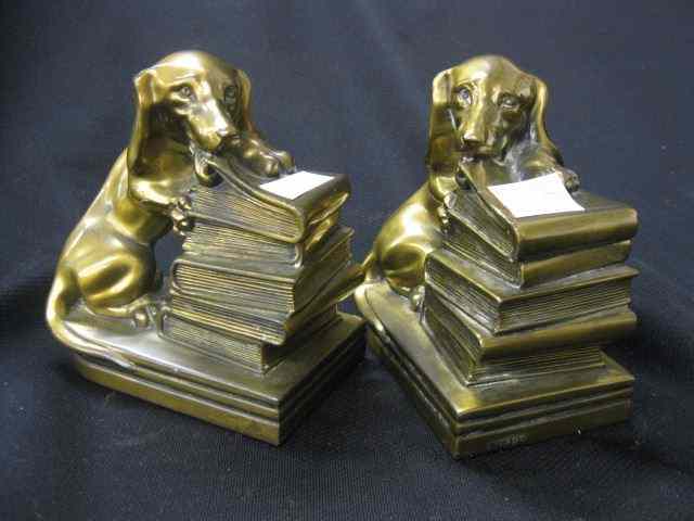 Appraisal: Pair of Art Deco Bronzed Dachsund Bookends dogs with books