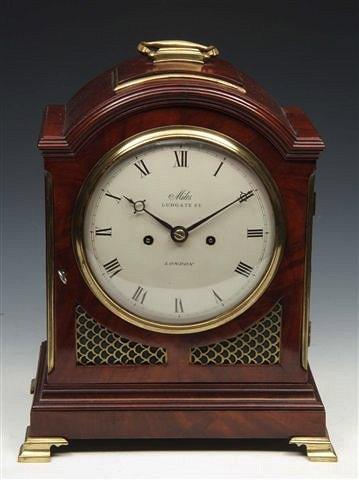 Appraisal: A REGENCY MAHOGANY BRACKET CLOCK the case with break arch