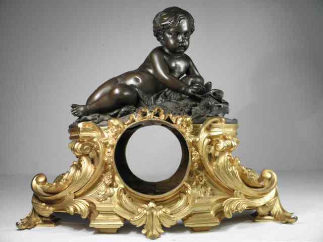 Appraisal: A French Rococo style bronze and gilt bronze figural mantel