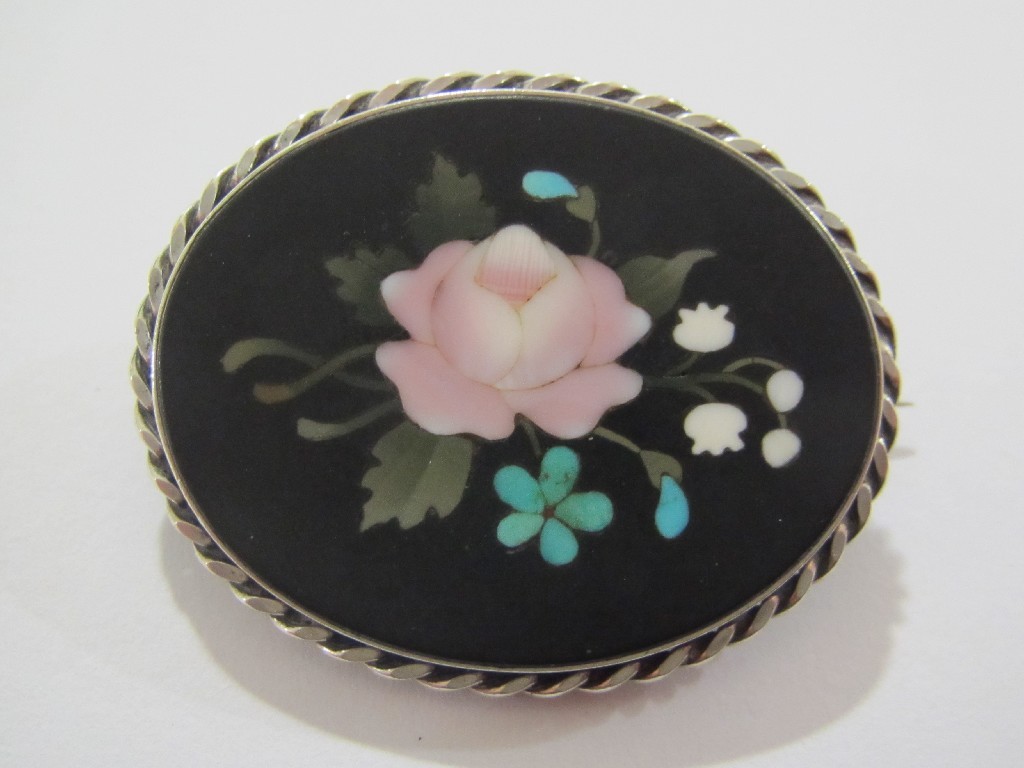 Appraisal: Silver mounted pietra dura oval shaped brooch