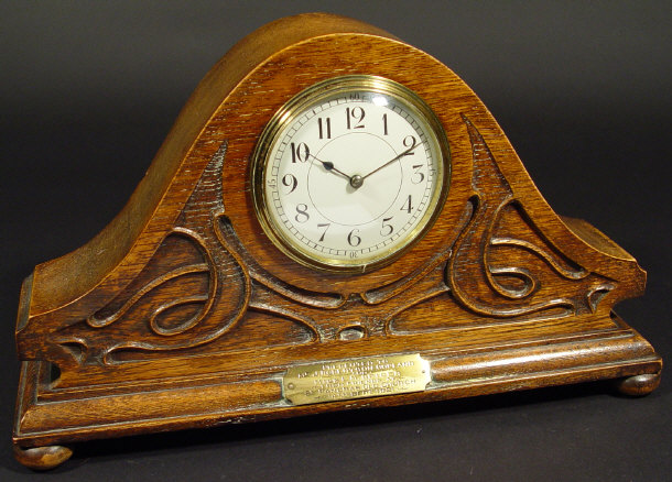 Appraisal: Art Nouveau oak cased mantel clock with painted enamel dial