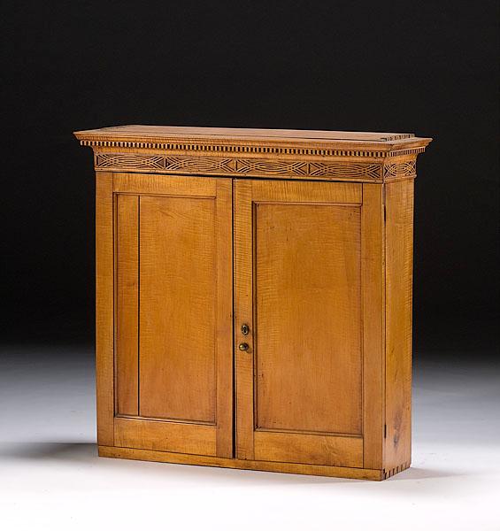 Appraisal: CHIPPENDALE CUPBOARD IN CURLY MAPLE American ca - with cedar