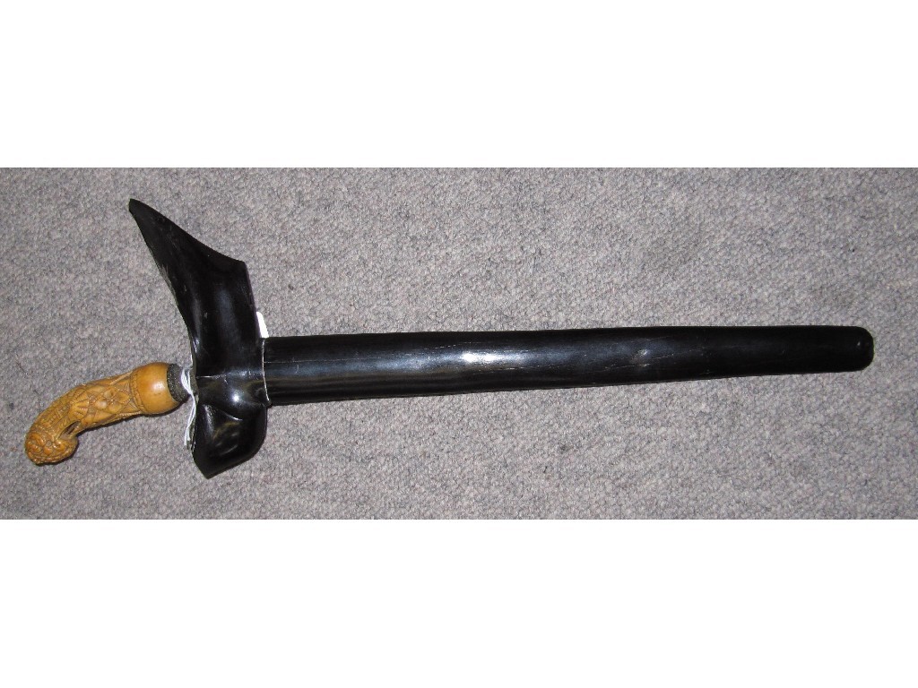 Appraisal: Kris with carved bone hilt in scabbard