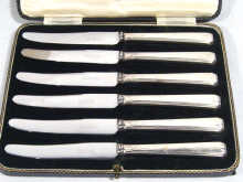 Appraisal: A boxed set of six silver handled art deco side