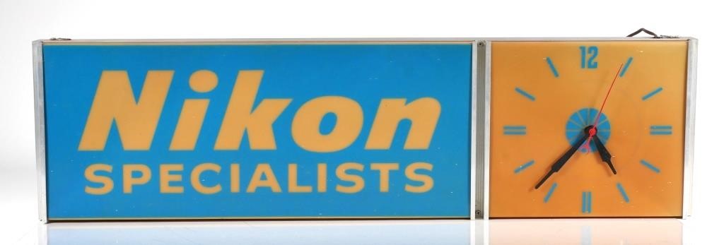 Appraisal: Rare Nikon camera shop dealer advertising sign with clock Made