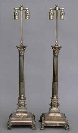 Appraisal: PAIR OF ENGLISH SILVER-PLATED COLUMN-FORM LAMPS Each stop-fluted stem with