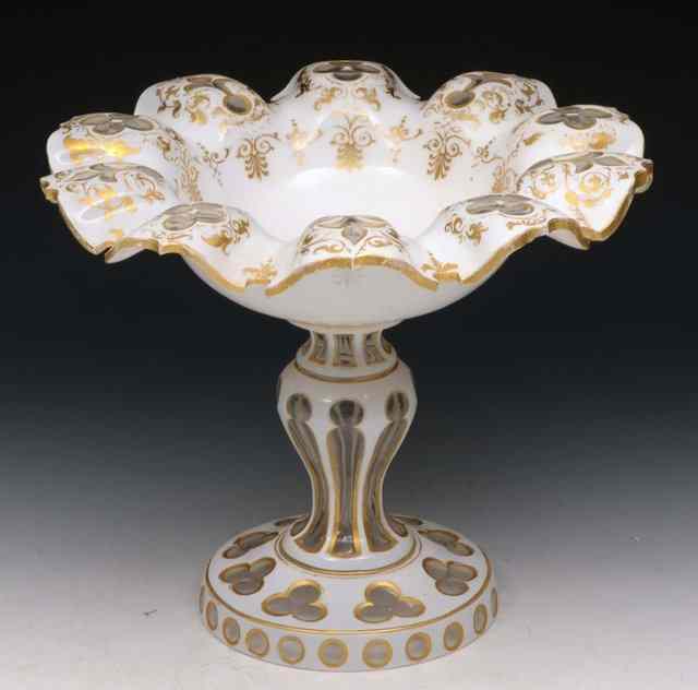 Appraisal: A BOHEMIAN WHITE AND CLEAR GLASS TABLE CENTRE with gilt