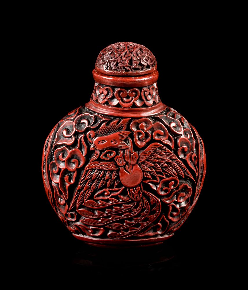 Appraisal: A Carved Red Lacquer Snuff Bottle Height overall in cm