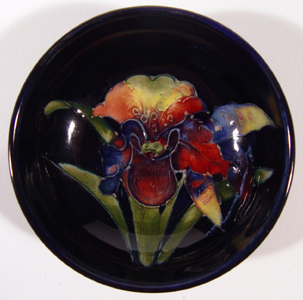 Appraisal: Moorcroft pottery pin dish hand painted and tubelined with an