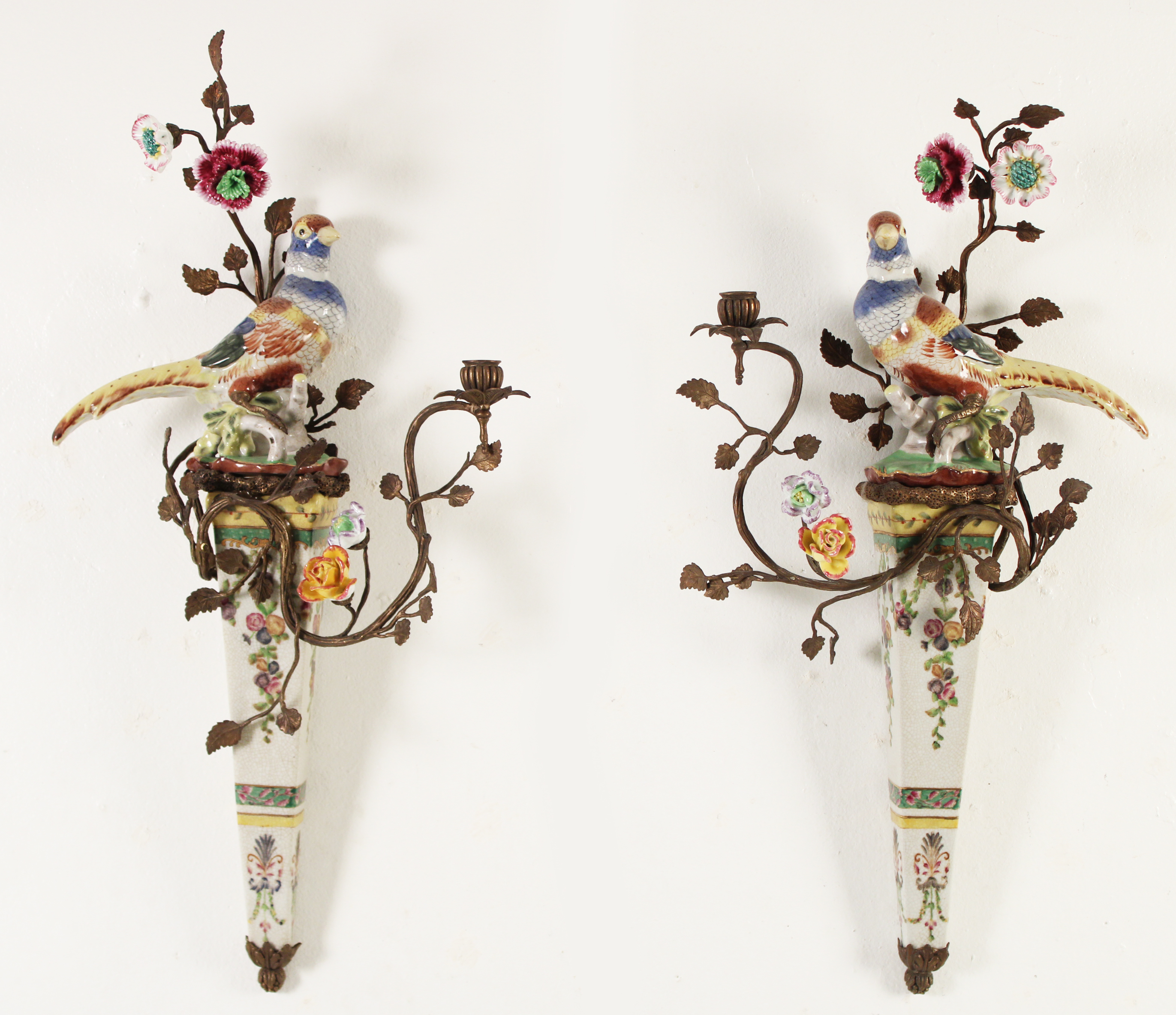 Appraisal: PAIR OF PORCELAIN WALL SCONCES Pair of porcelain and bronze