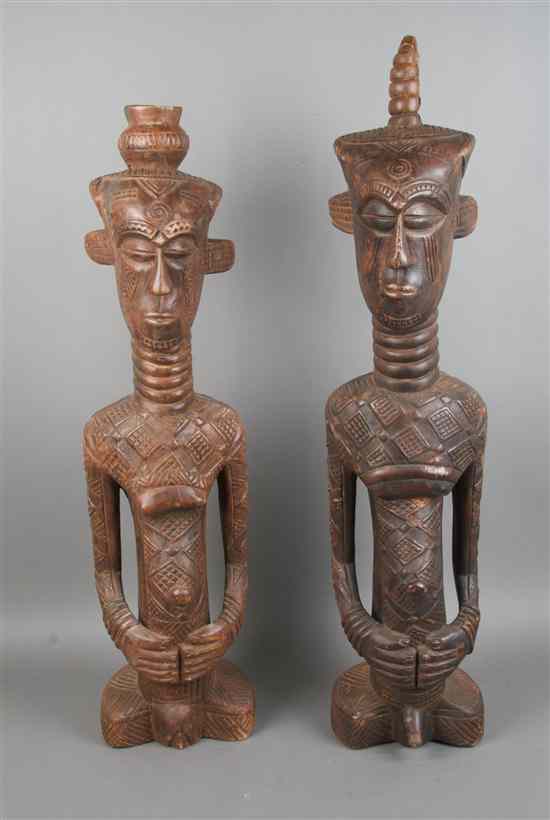 Appraisal: A Pair of Carved Wood Figures Dengese depicting a male