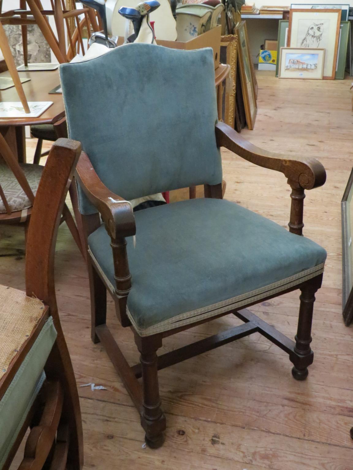 Appraisal: A solid dark oak carver chair and two late Victorian