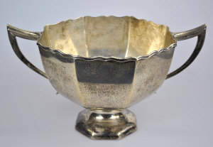 Appraisal: An Edwardian octagonal silver two-handled rose bowl on stemmed foot