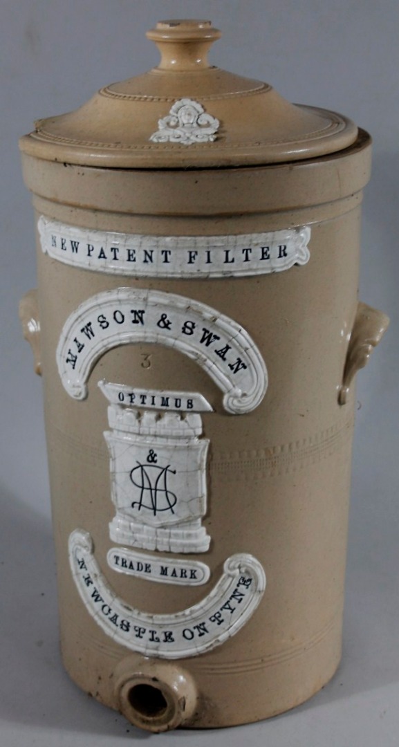 Appraisal: A thC Mawson Sawn patented stoneware water filter with domed