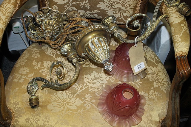 Appraisal: AN EDWARDIAN BRASS RISE AND FALL CEILING LIGHT with two