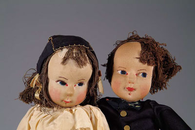 Appraisal: TWO UNUSUAL BOY GIRL STOCKINET DOLLS A pair of unique