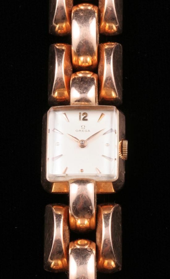 Appraisal: K ROSE GOLD OMEGA WRIST WATCH Square case centered silvered