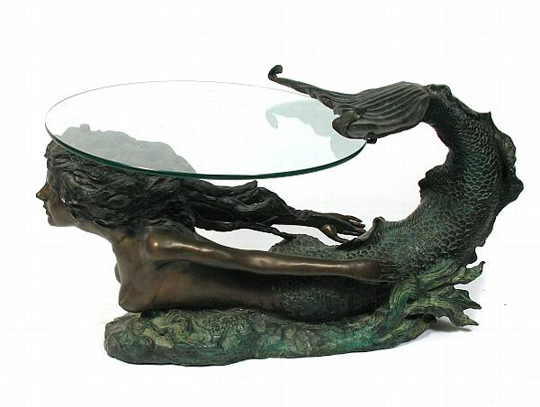 Appraisal: A patinated bronze figural table the glass top supported by