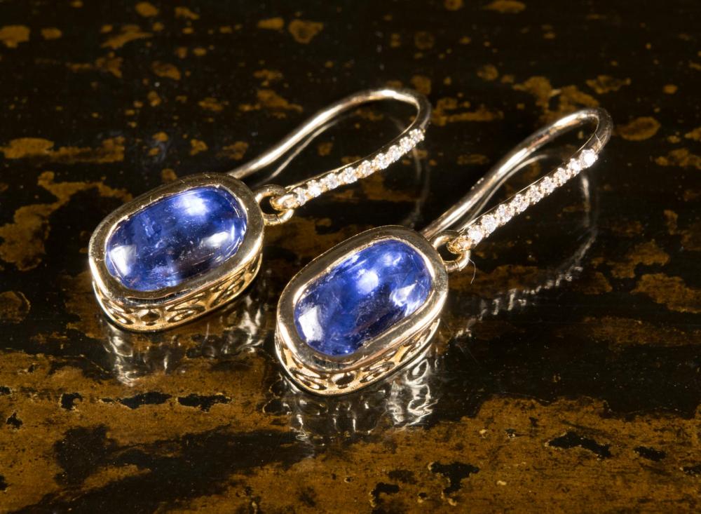 Appraisal: PAIR OF SAPPHIRE AND DIAMOND DANGLE EARRINGS each with a