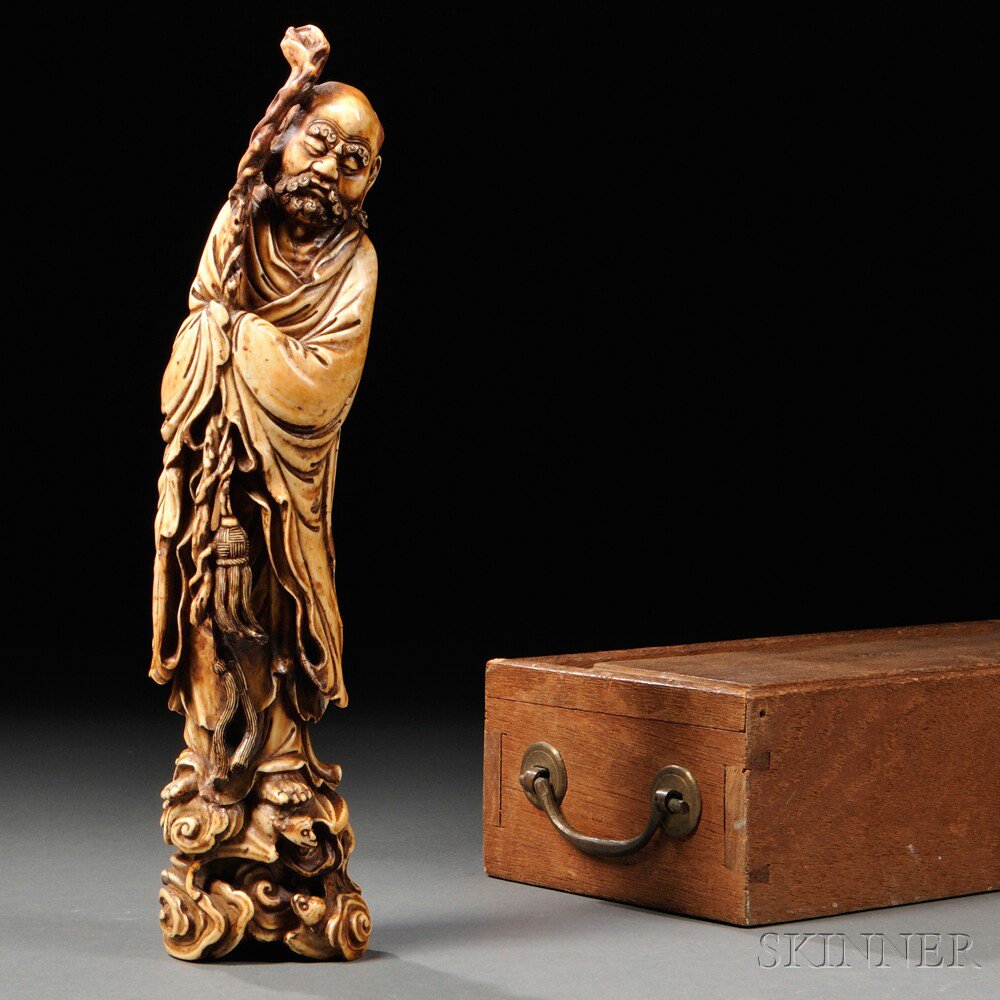 Appraisal: Ivory Carving of a Bearded Immortal Japan th th century