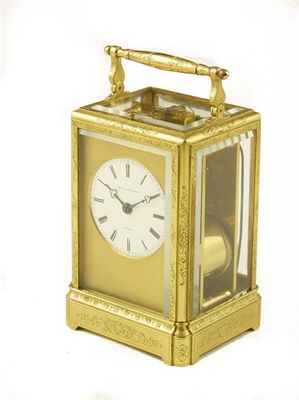 Appraisal: A th century gilt brass one piece carriage clock with