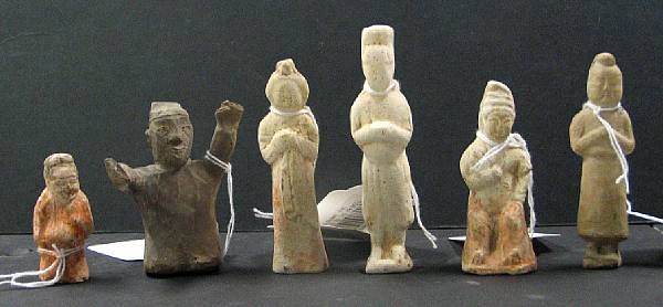 Appraisal: Six small pottery figures Including five Tang style figures and