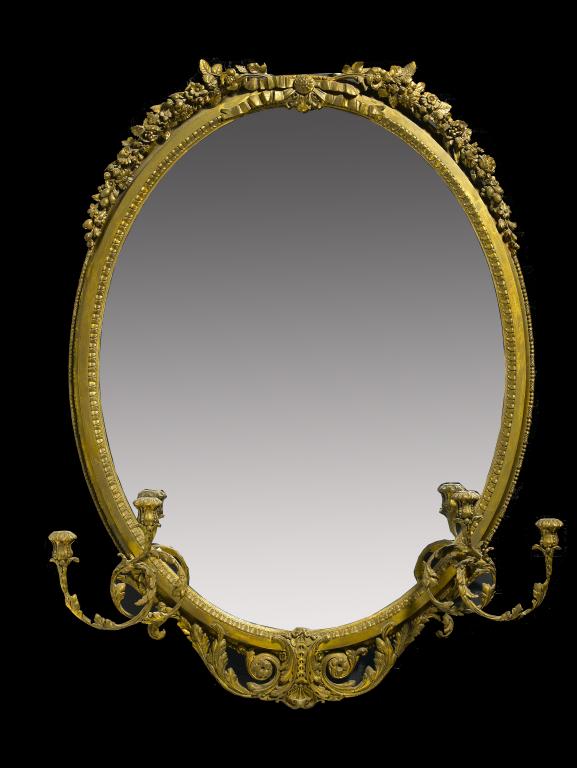 Appraisal: A VICTORIAN GILTWOOD AND GILT COMPOSITION OVAL OVERMANTEL MIRROR the