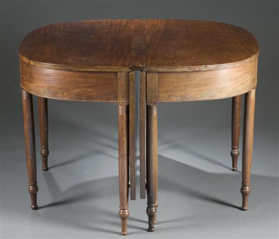 Appraisal: Regency style dining table Mid th century Two D-shaped mahogany