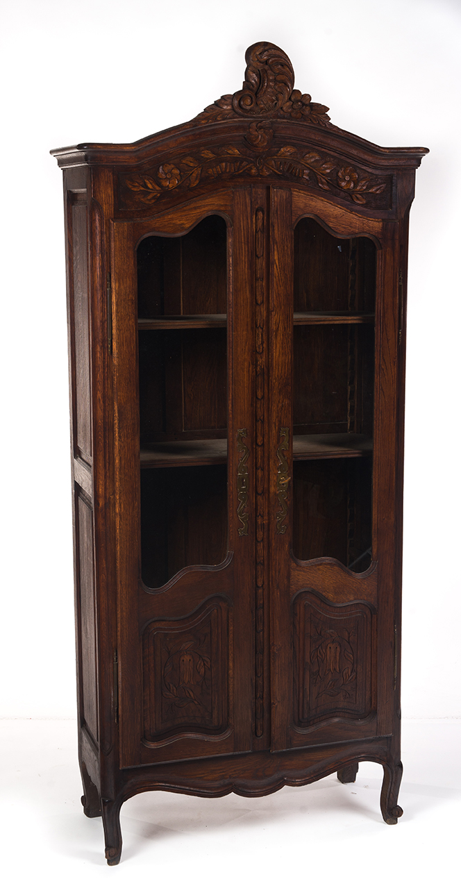 Appraisal: FRENCH-STYLE TWO-DOOR LIBRARY CABINET European th century oak Ornately carved