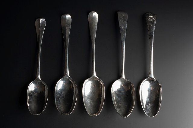 Appraisal: A SILVER OLD ENGLISH PATTERN AND FEATHER EDGE TABLESPOON the