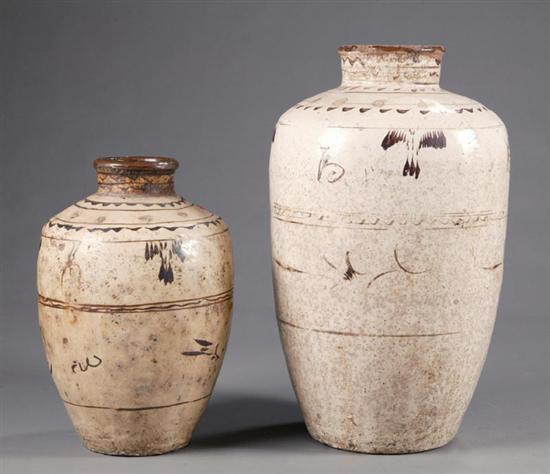 Appraisal: TWO WINE STORAGE VESSELS China attributed to the th century