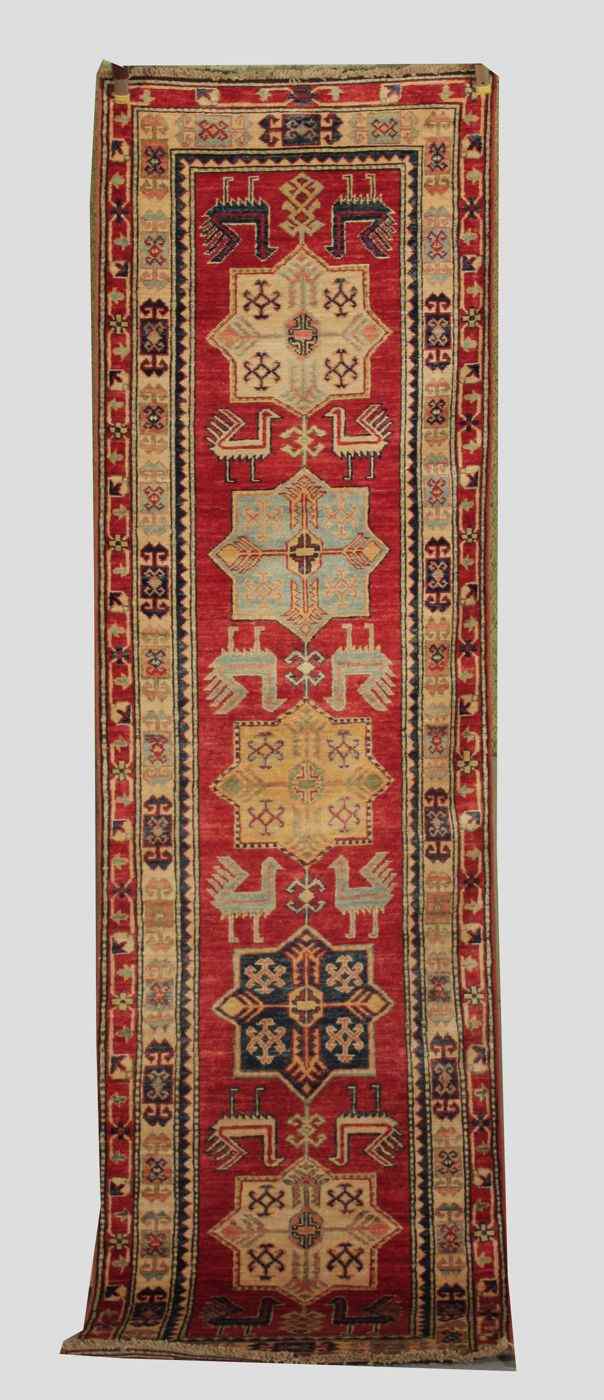 Appraisal: ORIENTAL RUG KAZAK DESIGN ' x ' '' Five gabled