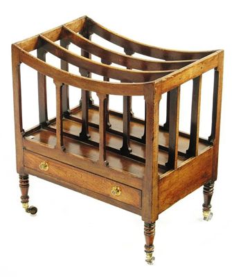 Appraisal: An early th century mahogany canterbury with three dipped divisions