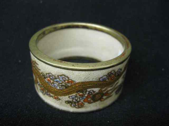 Appraisal: Japanese Satsuma Pottery Napkin Ring elaborate gold dragon metal work