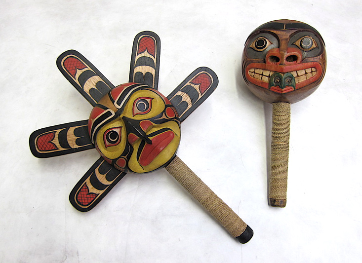 Appraisal: TWO NATIVE AMERICAN RATTLE MASKS having polychrome painted finishes with