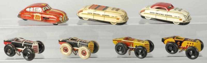 Appraisal: Lot of Tin Litho Marx Wind-Up Vehicle Toys Description American