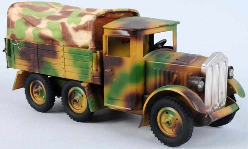 Appraisal: Hausser Clockwork Tinplate Military Truck Working clockwork Electric lights Exceptional