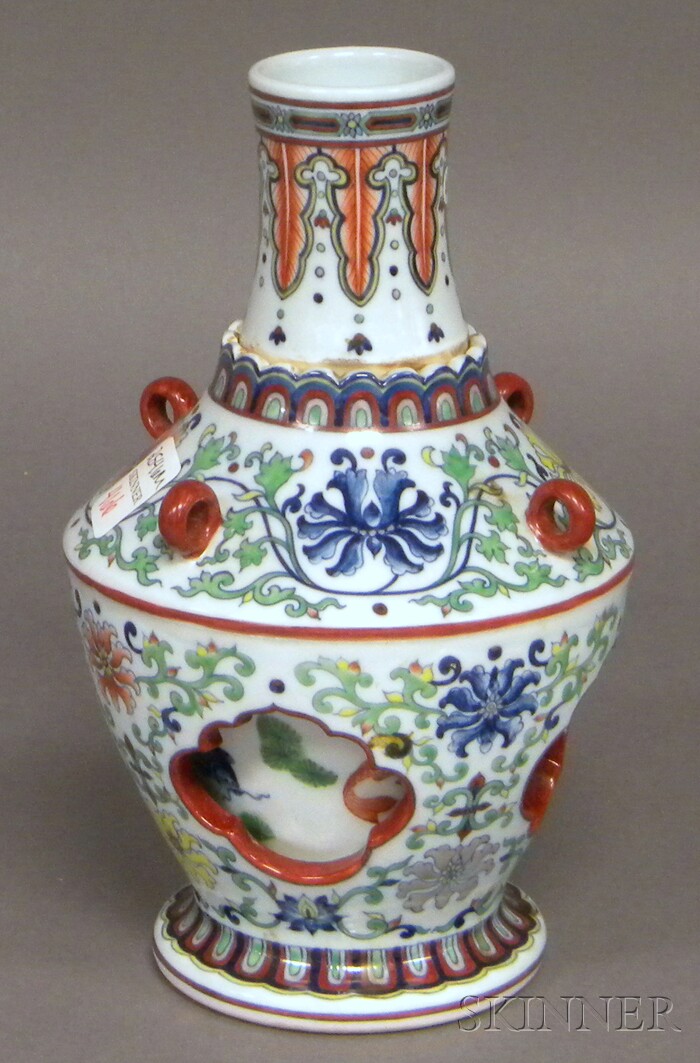 Appraisal: Chinese Doucai Porcelain Revolving Bottle-form Vase outer vase with botanical