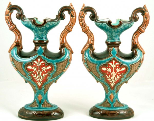 Appraisal: A pair of Majolica urns Geometric designs in dark brown