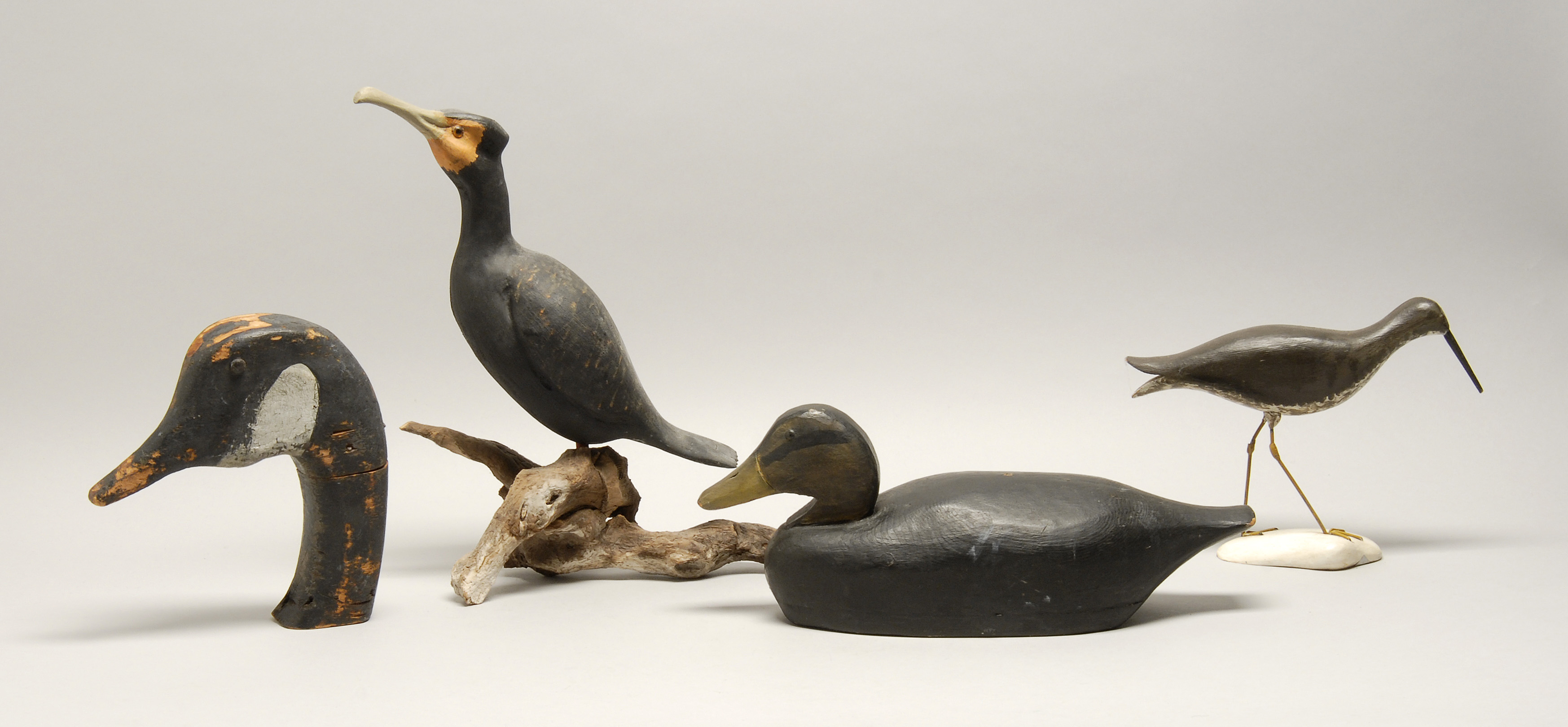 Appraisal: FOUR BIRD CARVINGS Attributed to Alfred Gardner of Accord Massachusetts