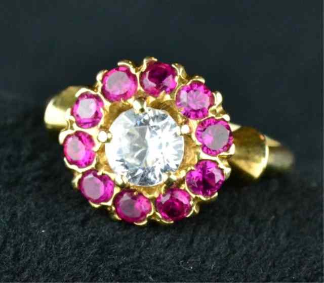 Appraisal: LADY'S RING - CZ AND SYNTHETIC RUBYConsisting of lovely karat