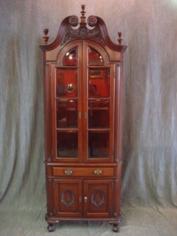 Appraisal: Chippendale Style Mahogany Corner Cabinet Beautiful quality with nice carvings