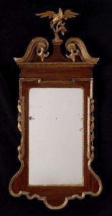 Appraisal: GEORGE II MAHOGANY AND PARCEL-GILT MIRROR The rectangular plate within