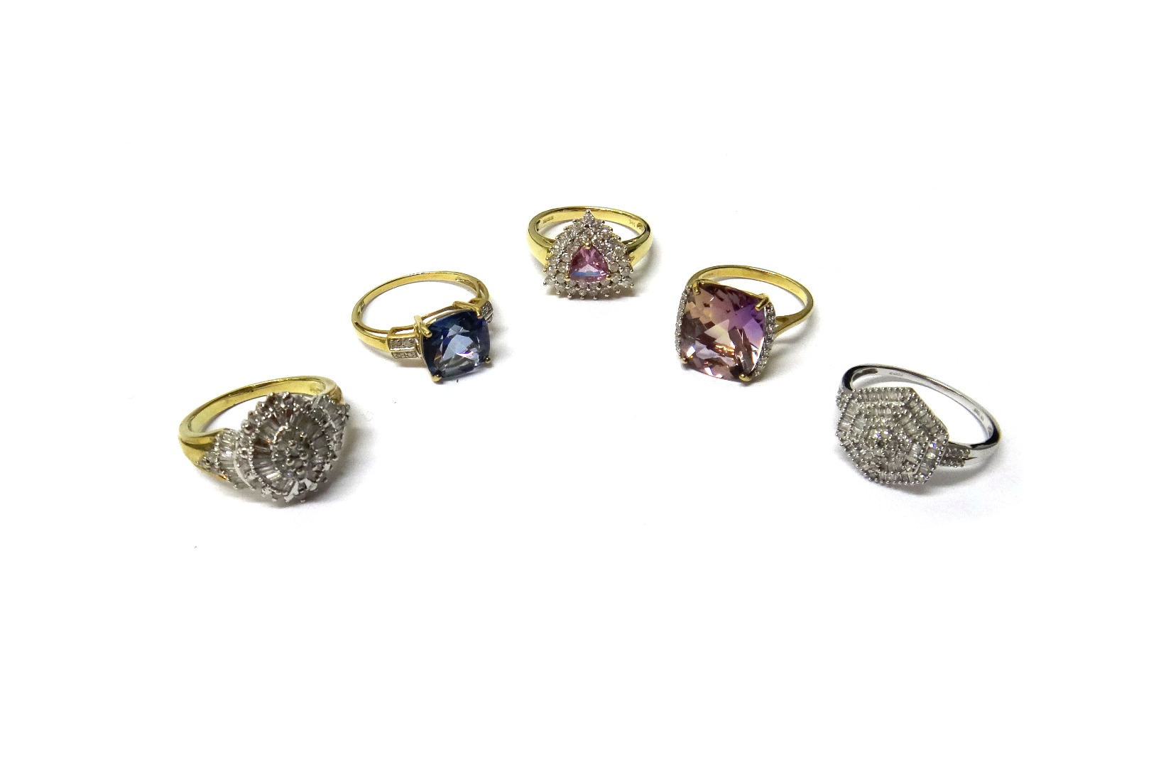 Appraisal: A ct gold diamond and pink gemstone set triangular cluster