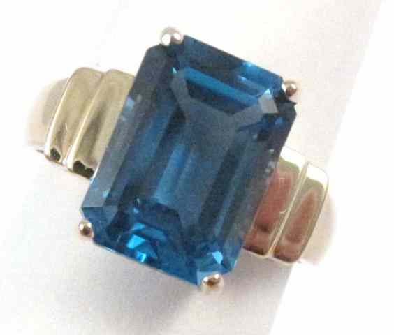 Appraisal: BLUE TOPAZ AND TEN KARAT GOLD RING set with an