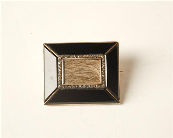 Appraisal: An E th C Gold Onyx and Hair Mourning Brooch