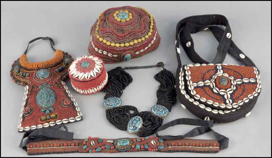 Appraisal: HIMALAYAN REGION BEADED ACCESSORIES Comprised of shells turquoise metal and